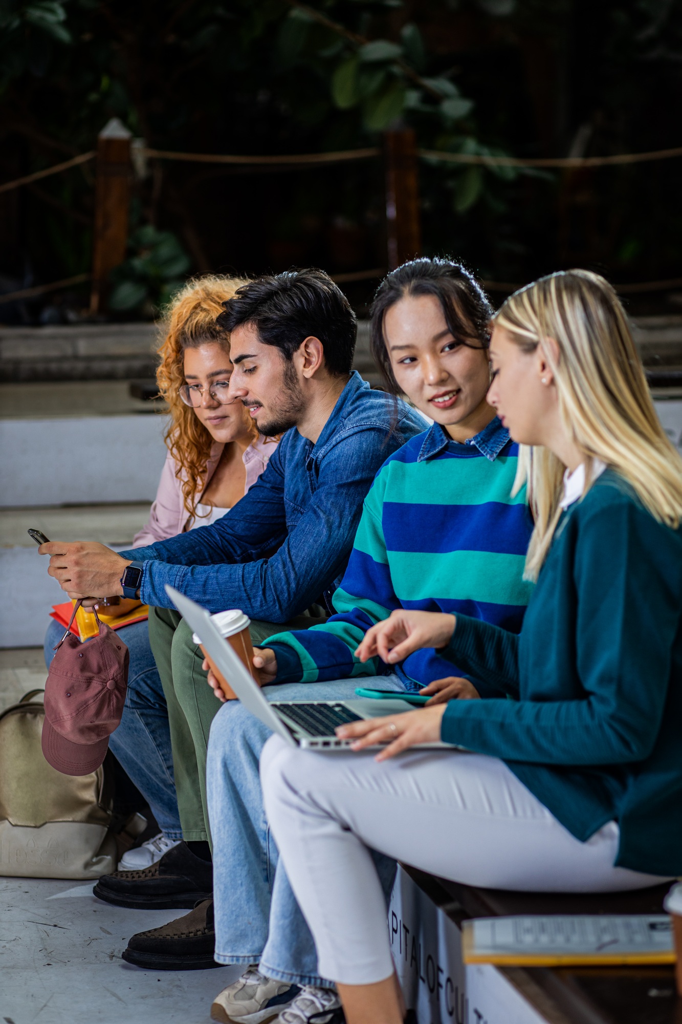 Group of student siting in campus learning together.
