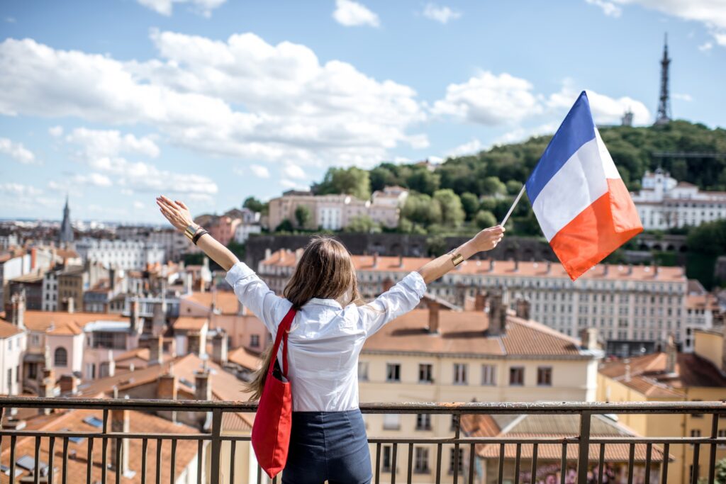Woman with french flag in Lyon